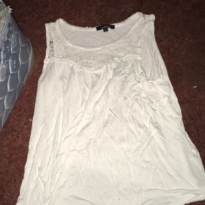 Plain white sleeveless shirt